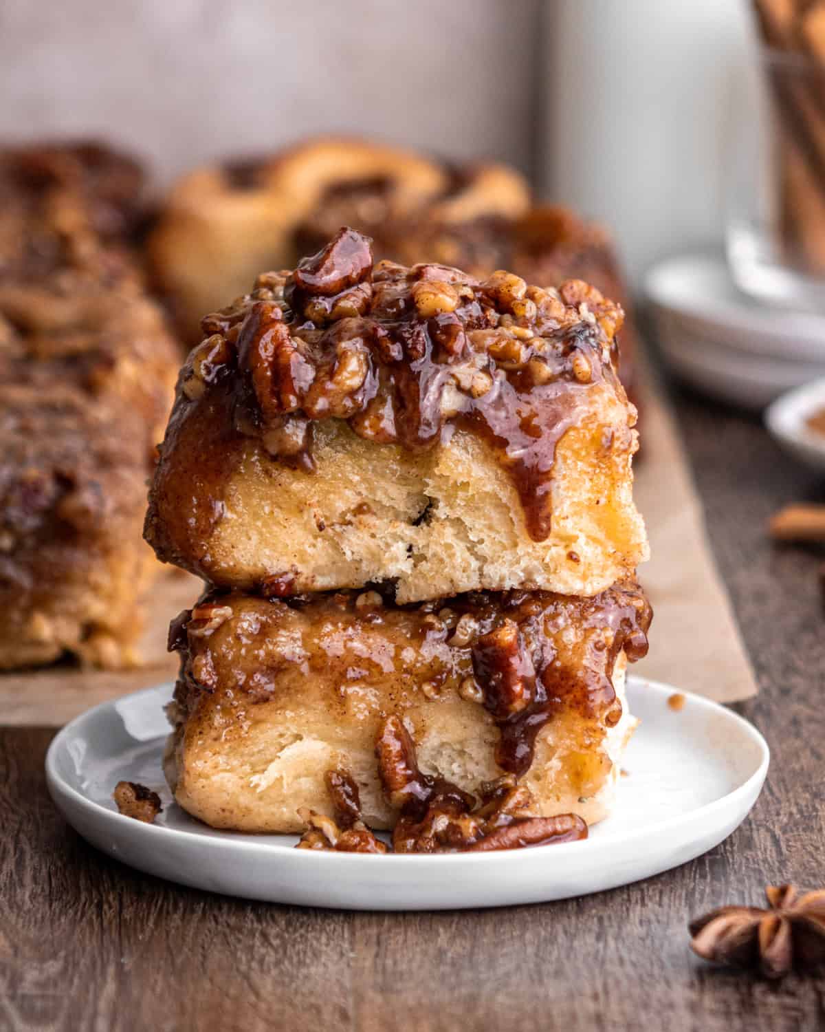 bourbon pecan sticky buns — salted maple glaze & crunchy nuts