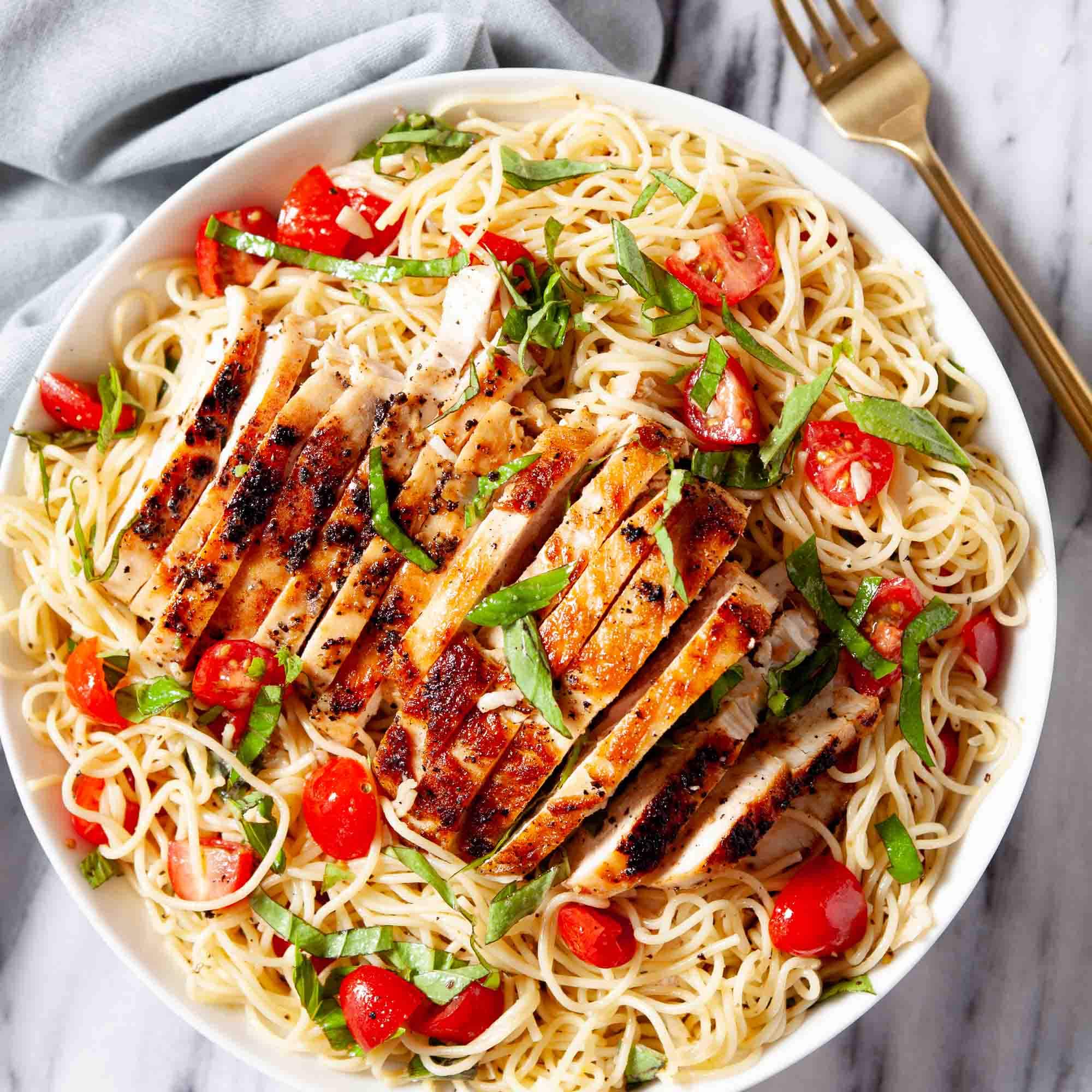 bruschetta chicken pasta — juicy, herby & bursting with tomato basil goodness