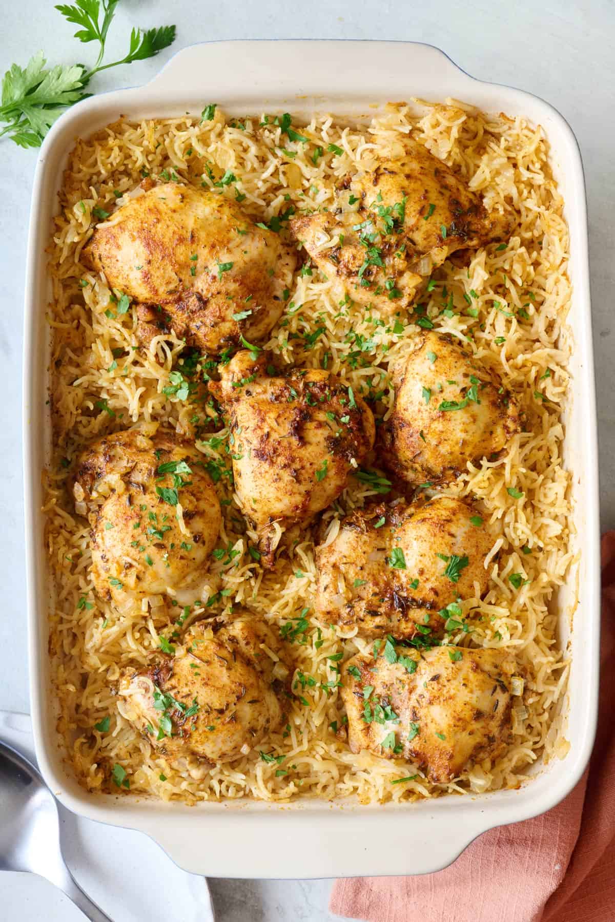 delicious oven baked chicken and rice — quick, simple & perfect for busy nights