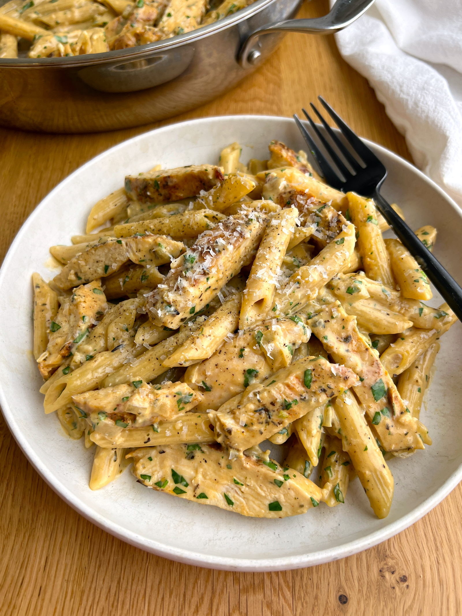 garlic parmesan chicken pasta — creamy savory dinner your family will love