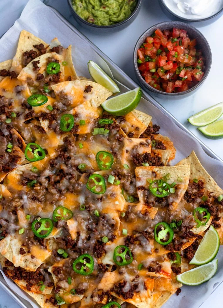loaded cheesy beef nachos — a crowd pleasing tex mex favorite