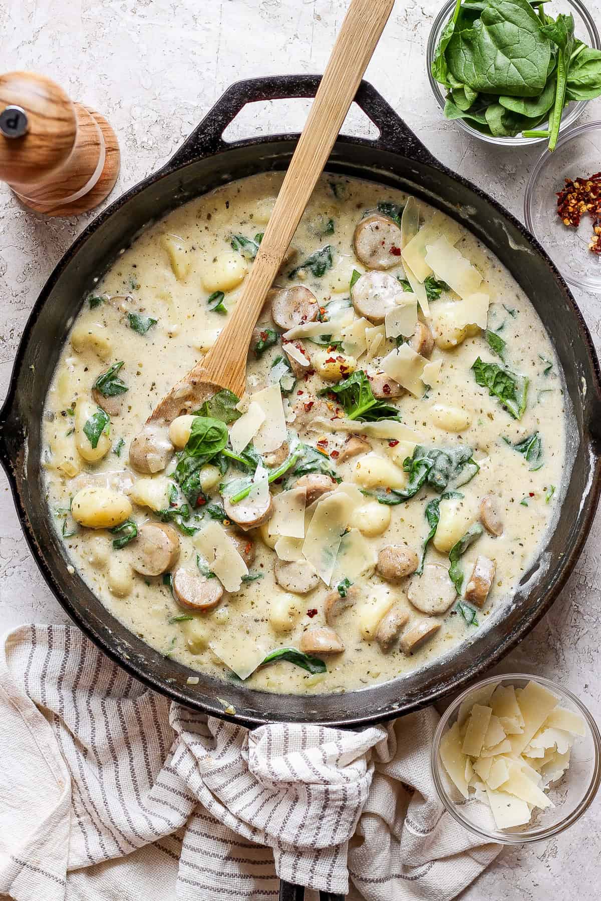 one pot creamy sausage gnocchi with spinach & cheese — comforting weeknight skillet meal