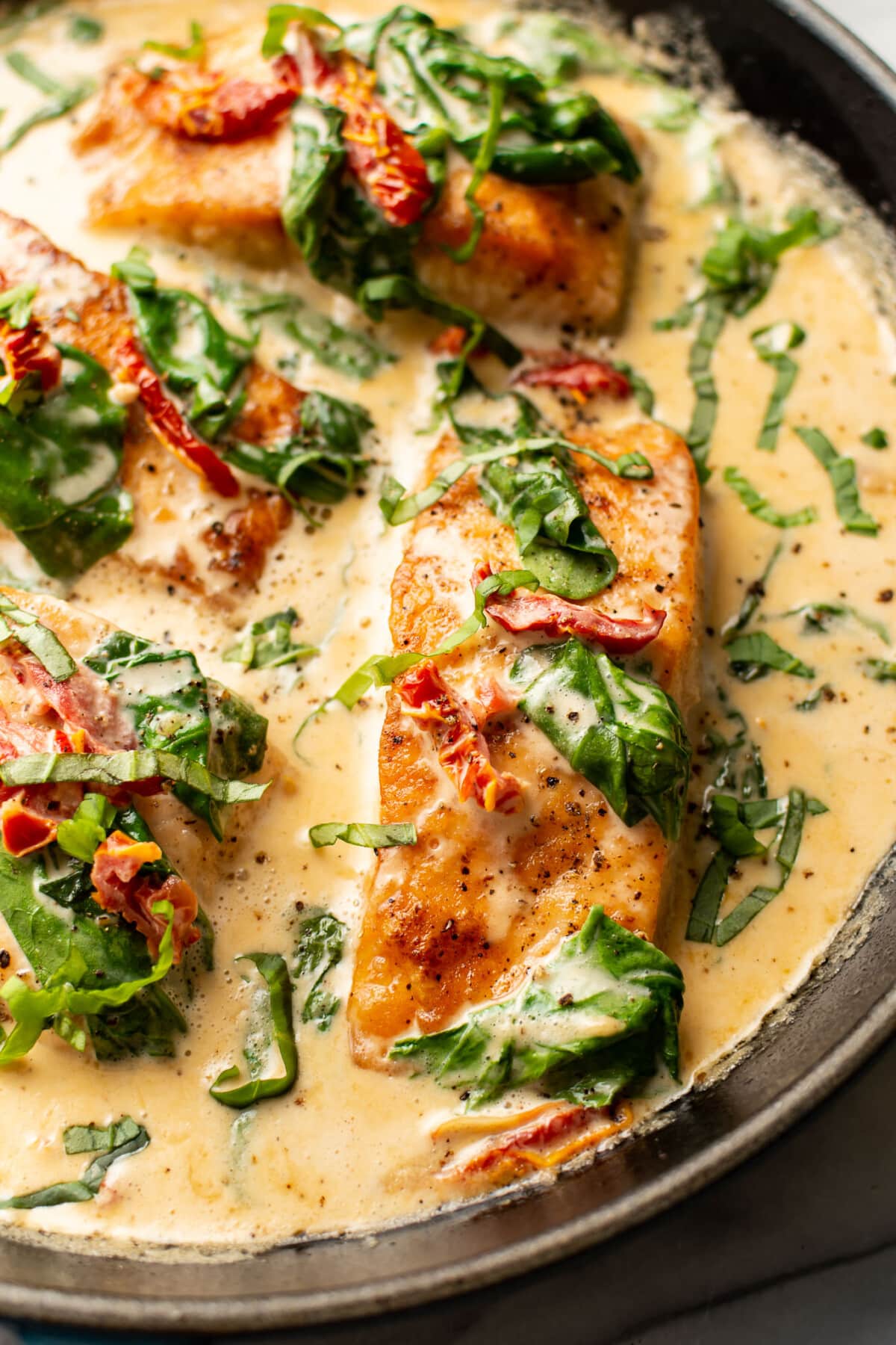one pot creamy tuscan salmon with sun dried tomatoes — elegant weeknight seafood meal