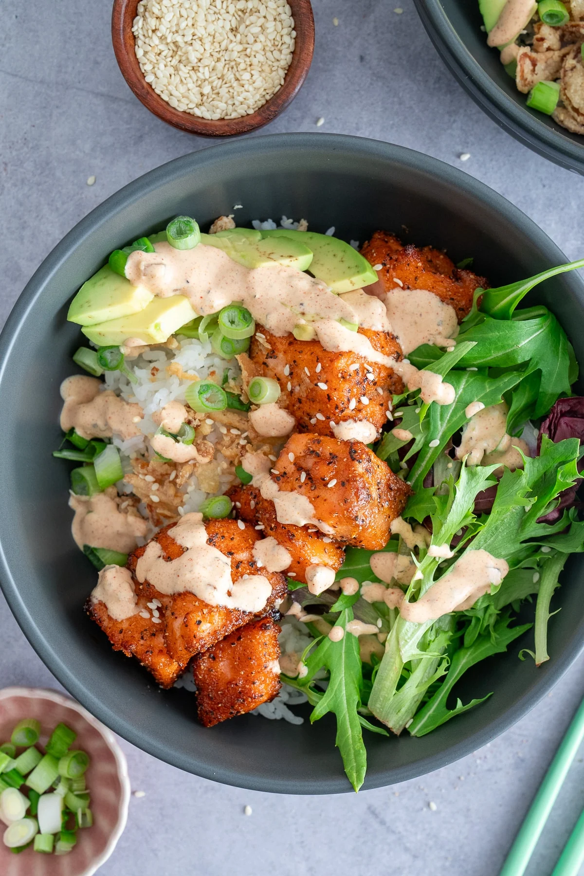 salmon avocado bowl — fresh, healthy & drizzled with a creamy sauce