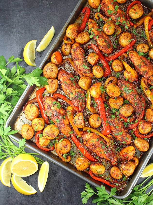 sheet pan harissa chicken & rainbow carrots — spicy one pan dinner